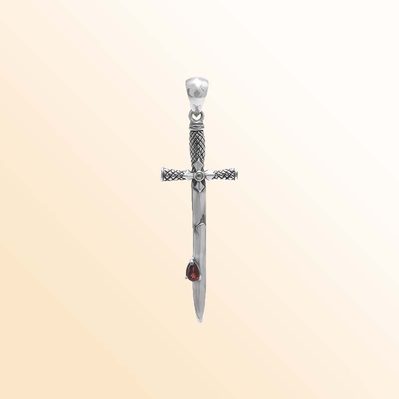Artistic sterling silver sword pendant featuring teardrop Red Garnet Quartz and carved cross guard details for modern expressive jewelry wearers