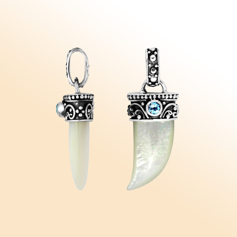 Artisan sterling silver Shell tusk pendant with Blue Topaz Quartz and Balinese ornamental detailing.