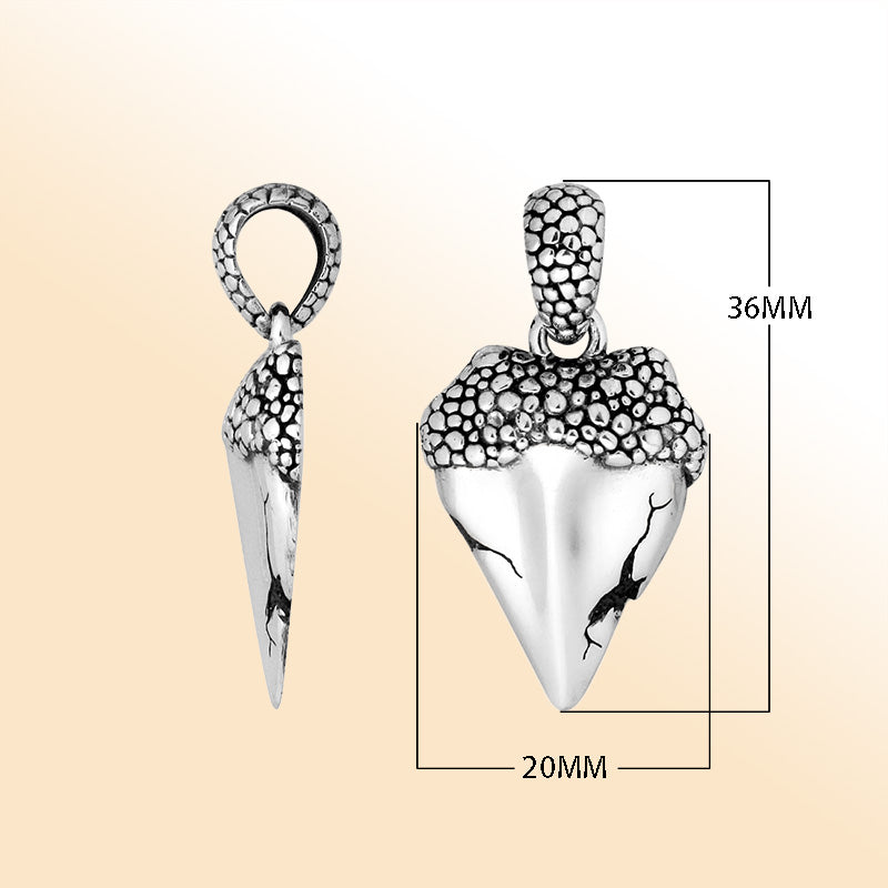 Artistic sterling silver cone pendant with cracked detailing and textured top.