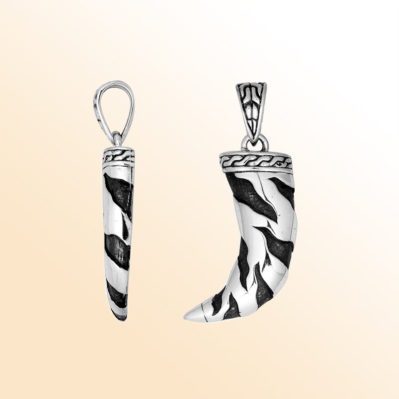 Artistic sterling silver sword-shaped pendant with oxidized pattern.