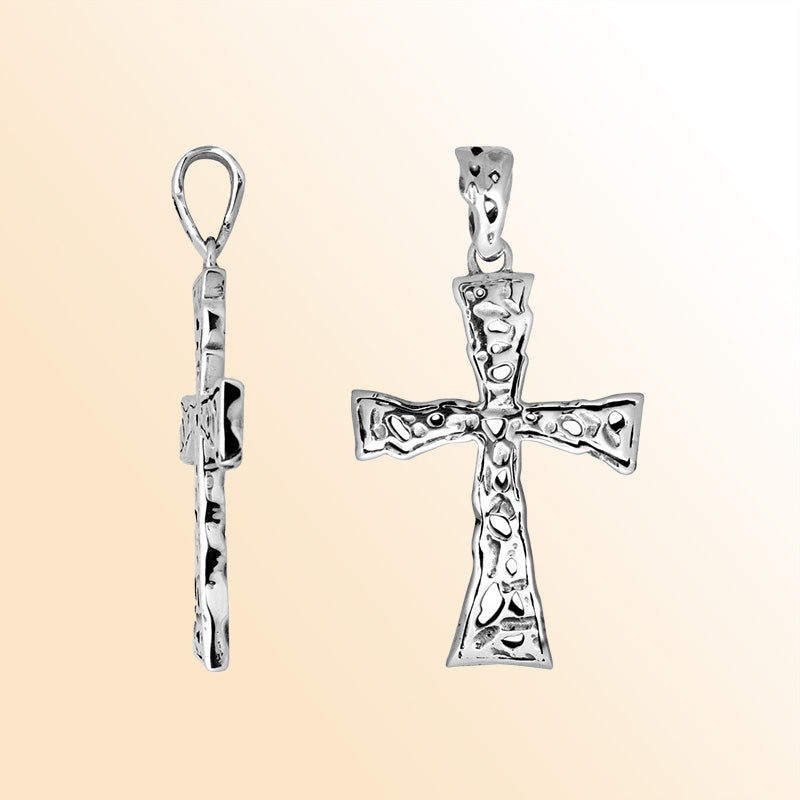 Artistic sterling silver hammered cross pendant with raised detailing.