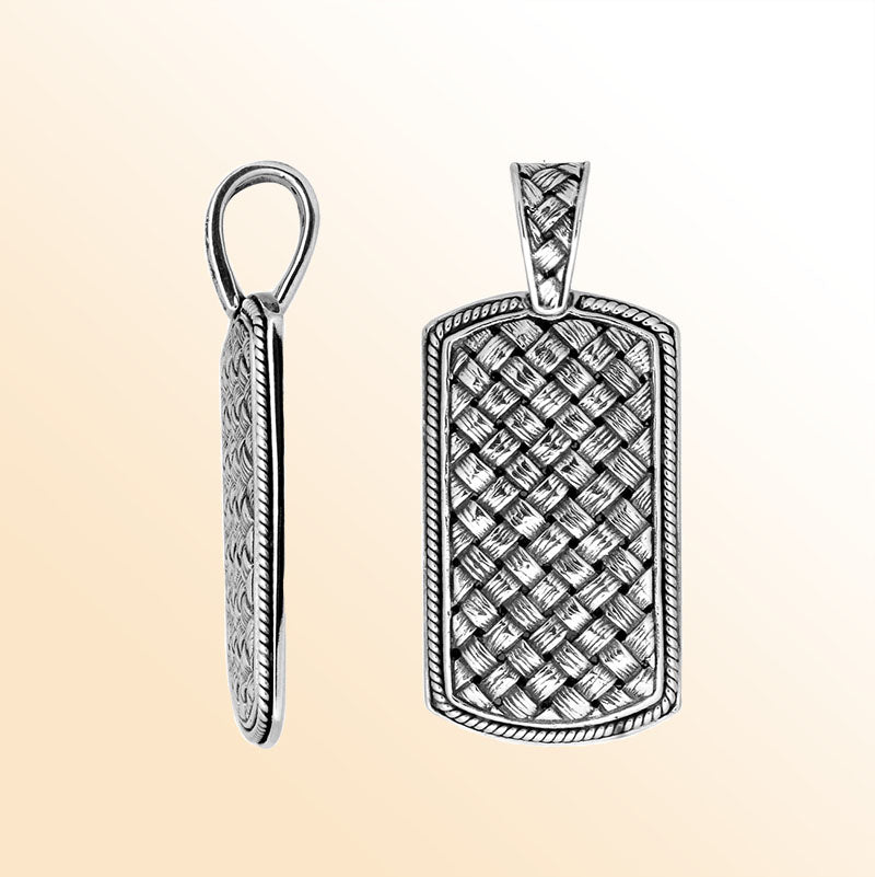 Artistic sterling silver rectangle pendant with woven textured pattern.