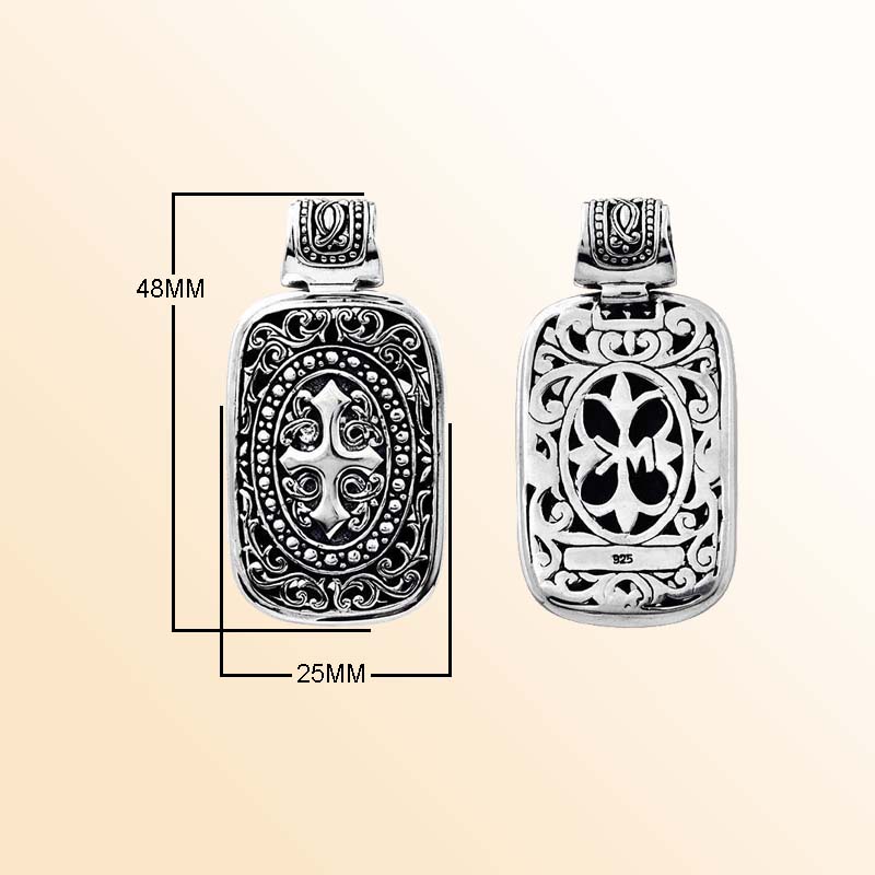 A handcrafted Silver Overlay Over Copper rectangular pendant featuring ornate Balinese scrollwork, oxidized detailing, polished overlay accents, and artistic silverwork designed for elegant daily or occasion wear.