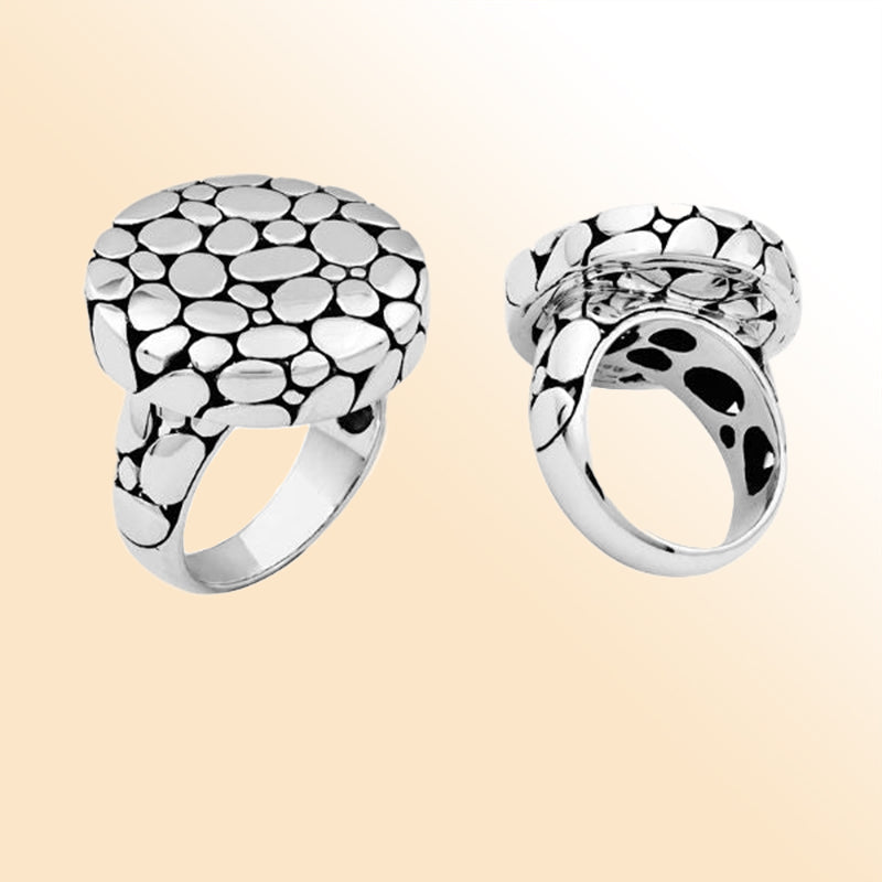Sterling silver pebble design statement ring, handcrafted in Bali with a polished finish, modern bold jewelry for everyday wear or special occasions.
