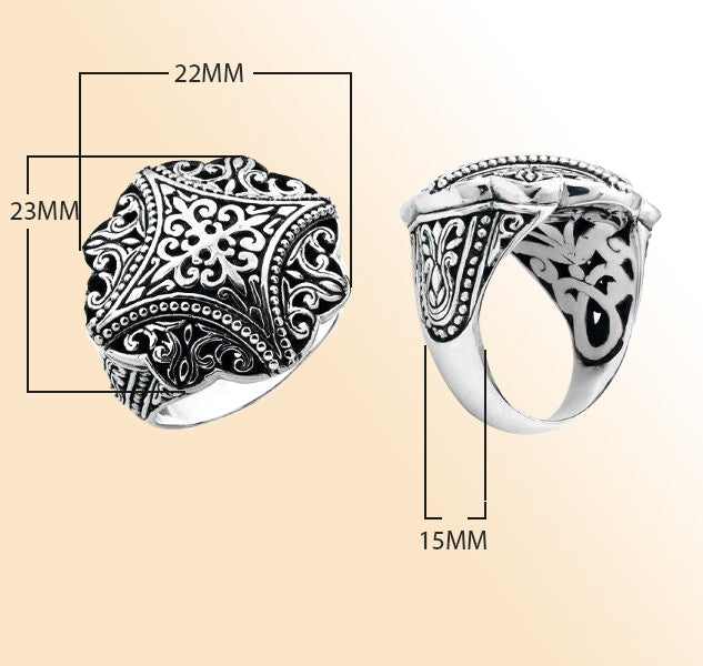 Sterling silver round filigree statement ring with detailed Balinese scrollwork, oxidized accents, and polished finish, handcrafted for timeless everyday style.