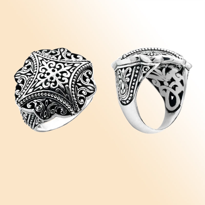 Sterling silver round filigree statement ring with detailed Balinese scrollwork, oxidized accents, and polished finish, handcrafted for timeless everyday style.