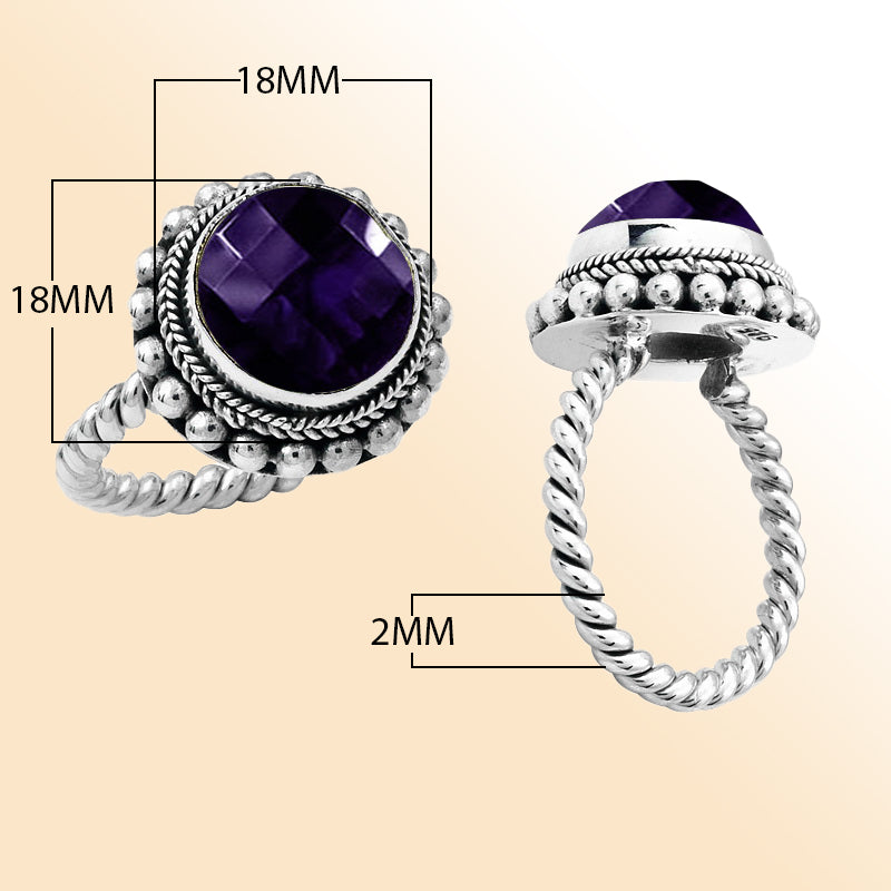 Handcrafted sterling silver Bali ring with faceted Amethyst Quartz and twisted rope band design.