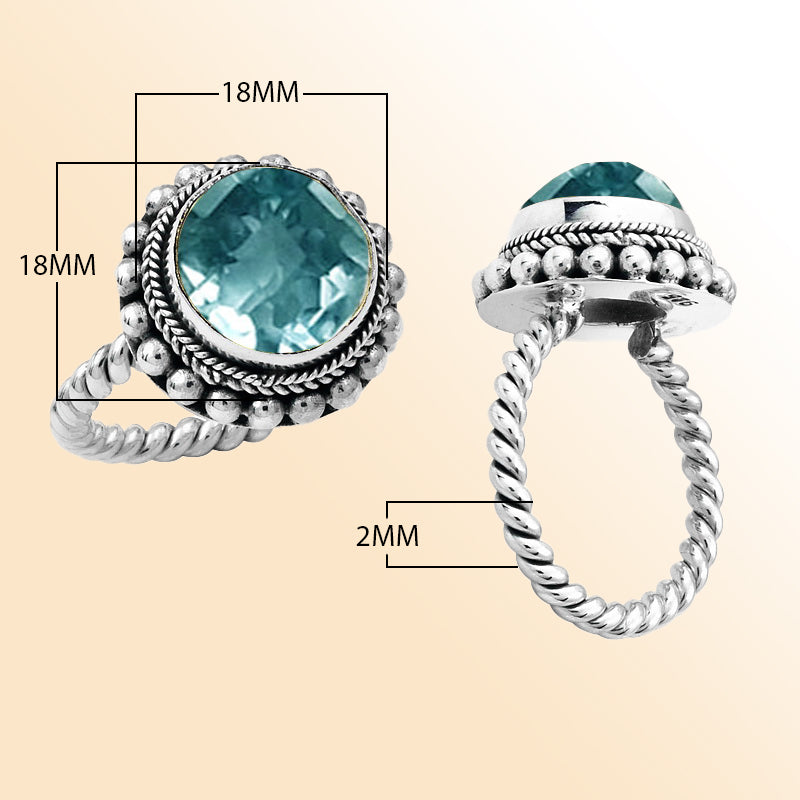 Handcrafted sterling silver Bali ring with faceted Blue Topaz Quartz and twisted rope band design.