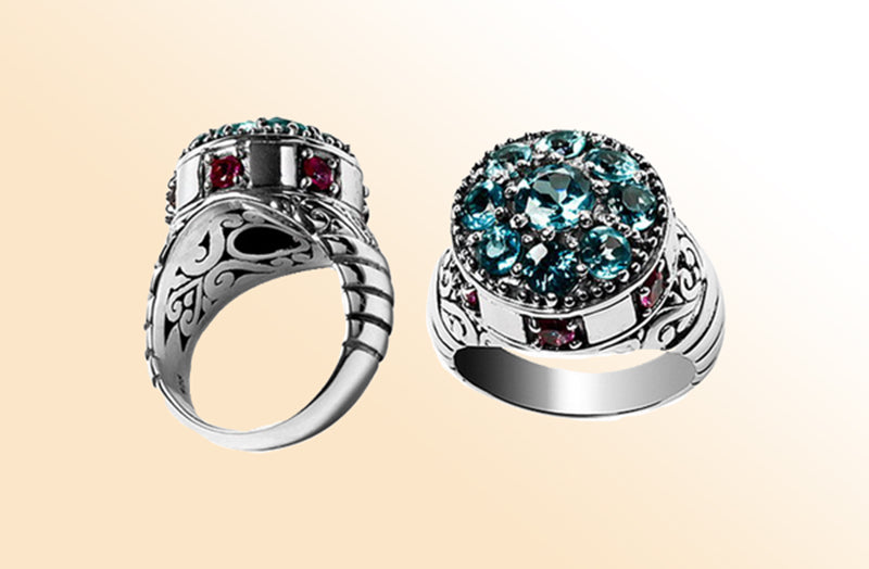 Sterling silver cluster ring with sparkling blue topaz quartz and ruby accents – bold artisan statement jewelry for women.
