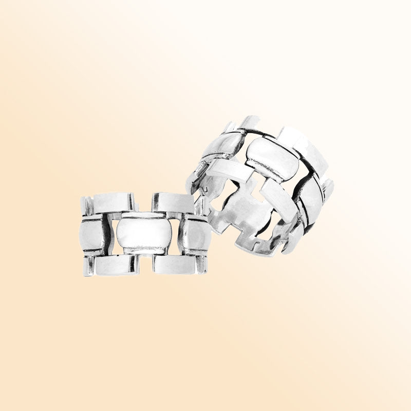 Sterling silver geometric link band ring with a bold modern design, polished finish, and unisex style, handcrafted for everyday wear or gifting.