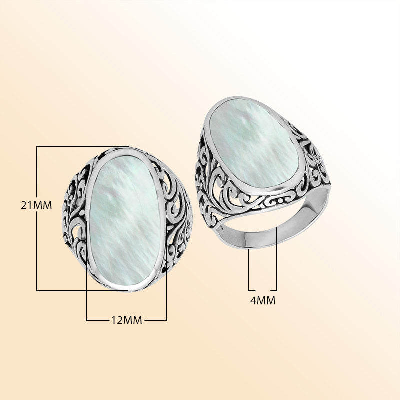 Sterling silver oval Mother of Pearl Shell ring with intricate Bali filigree detailing and oxidized finish, handcrafted artisan statement jewelry for women.