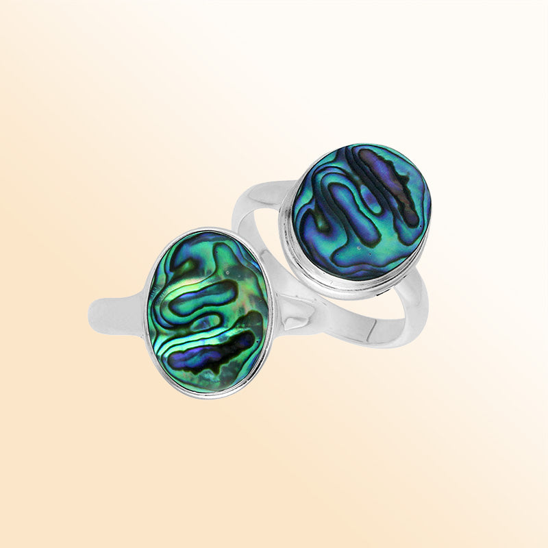 Sterling silver oval Abalone Shell ring with polished bezel setting, handcrafted artisan jewelry featuring shimmering iridescent shell shell.
