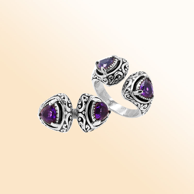 Sterling silver Bali scrollwork ring with trillion-cut purple Amethyst Quartz – artisan handcrafted statement jewelry for women.