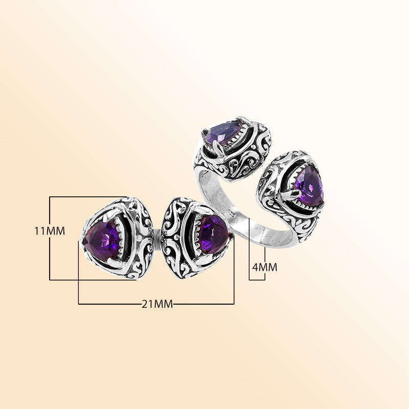 Sterling silver Bali scrollwork ring with trillion-cut purple Amethyst Quartz – artisan handcrafted statement jewelry for women.