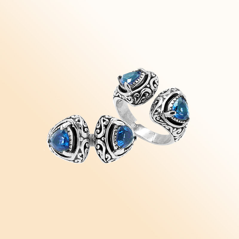 Sterling silver Bali scrollwork ring with trillion-cut Blue Topaz Quartz – artisan handcrafted statement jewelry for women.