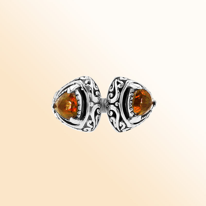 Sterling silver Bali scrollwork ring with trillion-cut golden Citrine Quartz– artisan handcrafted statement jewelry for women. 