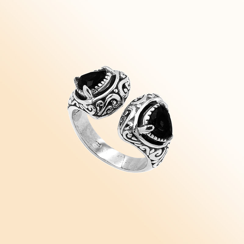 Sterling silver Bali scrollwork ring with trillion-cut Black Onyx Gemstone – artisan handcrafted statement jewelry for women.