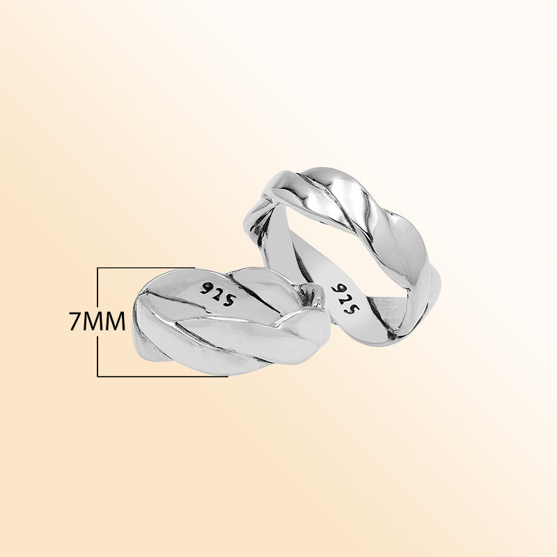 Sterling silver twisted braid band ring with polished finish – unisex artisan jewelry for everyday wear or stacking.