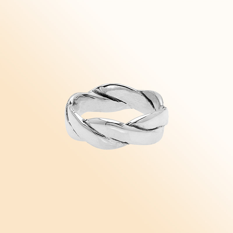 Sterling silver twisted braid band ring with polished finish – unisex artisan jewelry for everyday wear or stacking.