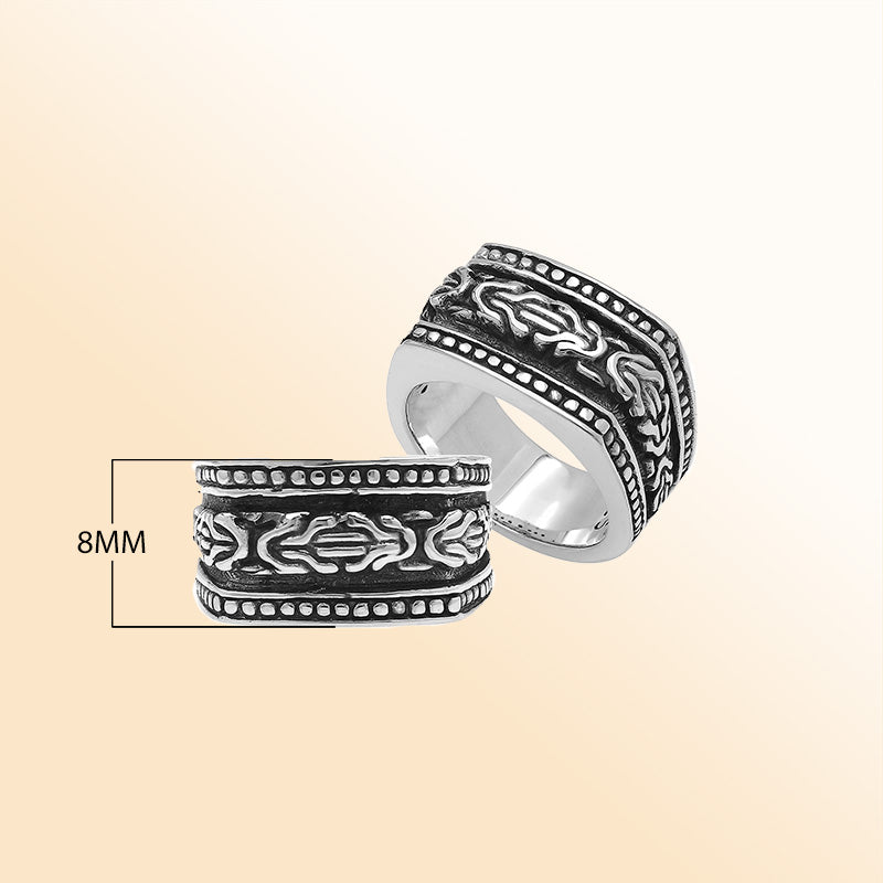 Handcrafted sterling silver Bali wide band ring with oxidized details and artisan carvings, unisex statement silver jewelry.