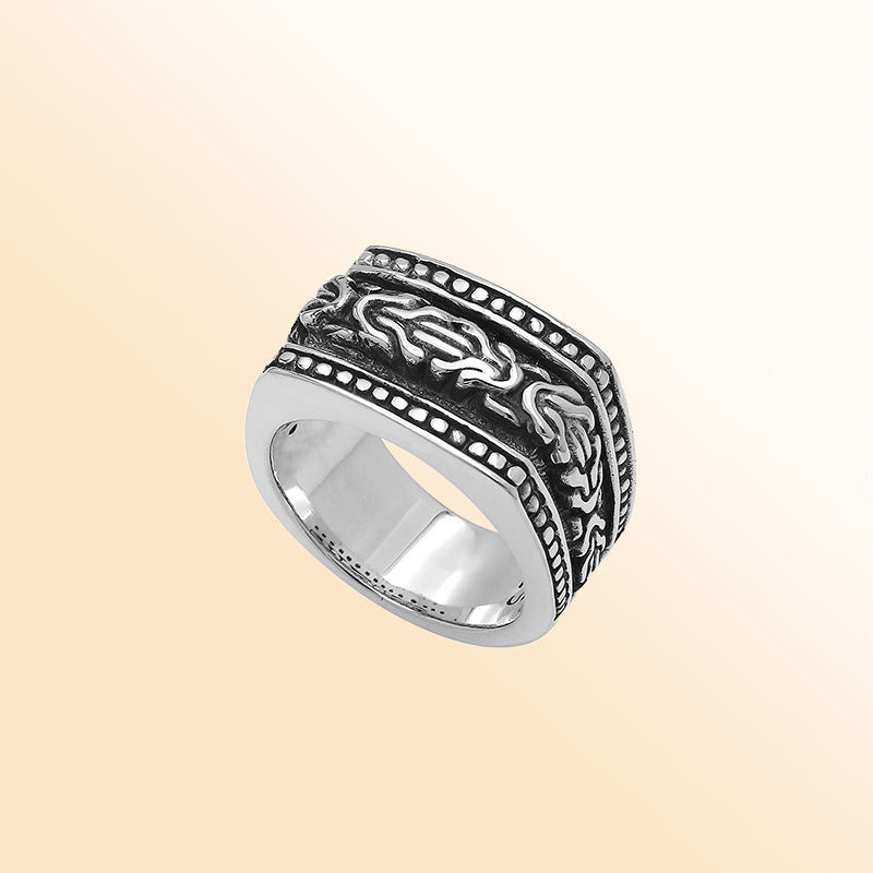 Handcrafted sterling silver Bali wide band ring with oxidized details and artisan carvings, unisex statement silver jewelry.