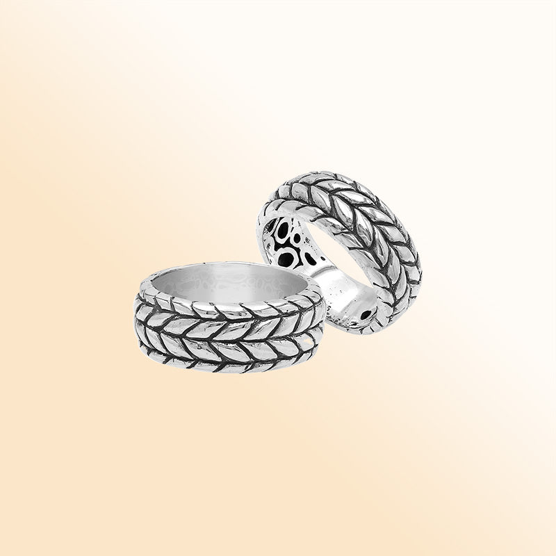 Handcrafted sterling silver woven leaf band ring with oxidized Bali design details, unisex artisan silver jewelry for everyday wear or gifting.