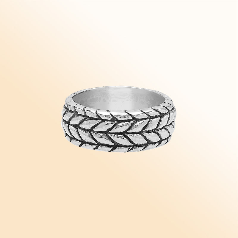 Handcrafted sterling silver woven leaf band ring with oxidized Bali design details, unisex artisan silver jewelry for everyday wear or gifting.