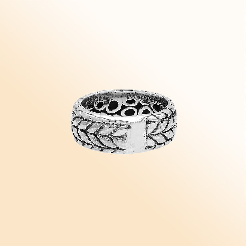 Handcrafted sterling silver woven leaf band ring with oxidized Bali design details, unisex artisan silver jewelry for everyday wear or gifting.