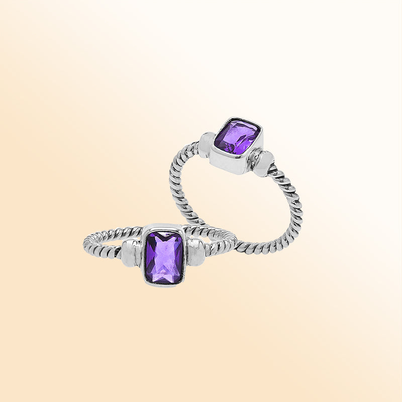 Handcrafted sterling silver twisted band ring with rectangular-cut Amethyst Quartz, artisan unisex jewelry for everyday wear or gifting.