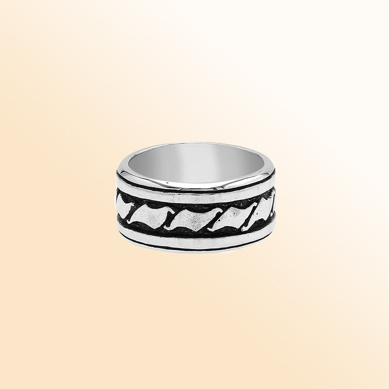 Handcrafted sterling silver wide band ring with wave-inspired Bali design and oxidized finish, unisex artisan jewelry for everyday wear or gifting.