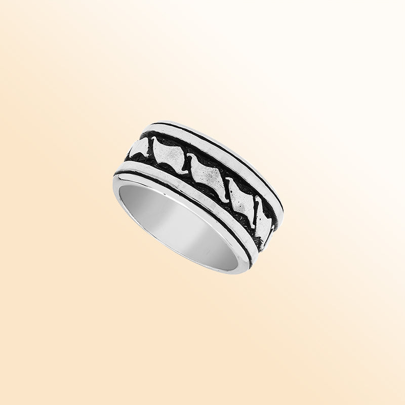 Handcrafted sterling silver wide band ring with wave-inspired Bali design and oxidized finish, unisex artisan jewelry for everyday wear or gifting.