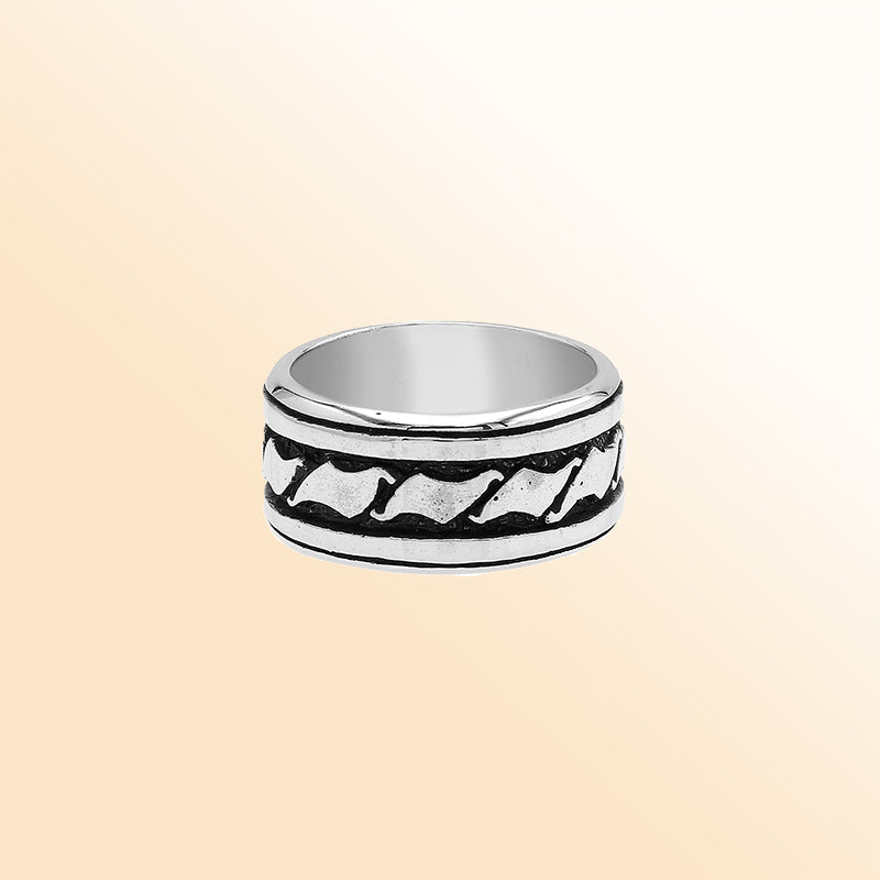 Handcrafted sterling silver wide band ring with wave-inspired Bali design and oxidized finish, unisex artisan jewelry for everyday wear or gifting.