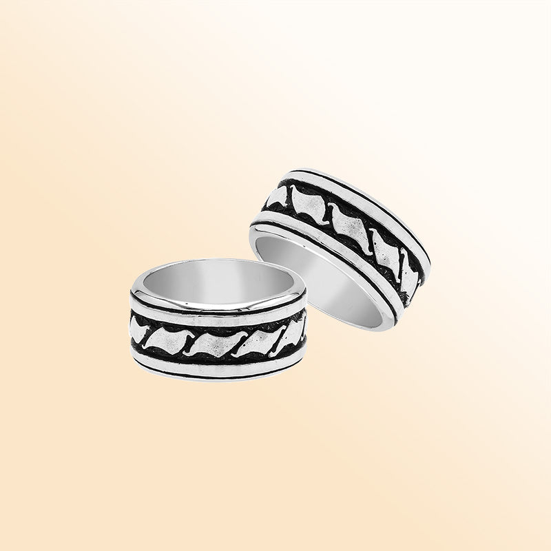 Handcrafted sterling silver wide band ring with wave-inspired Bali design and oxidized finish, unisex artisan jewelry for everyday wear or gifting.