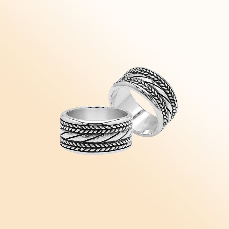 Handcrafted sterling silver wide band ring with diagonal rope Bali-inspired design and oxidized finish, unisex artisan jewelry for everyday wear or gifting.