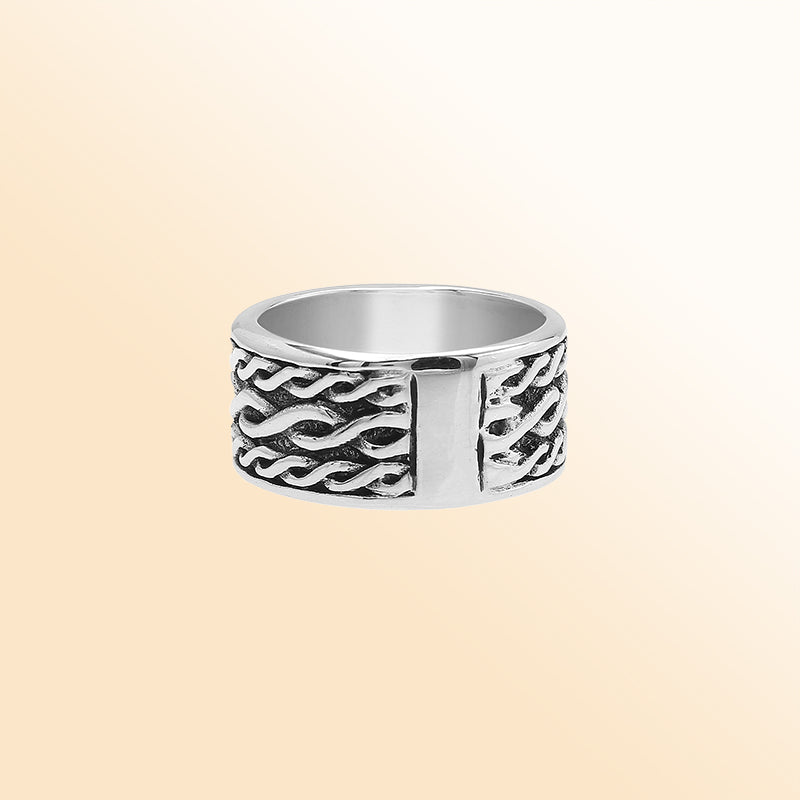 Handcrafted sterling silver wide band ring with wavy braid Bali-inspired design and oxidized finish, unisex artisan jewelry for everyday wear or gifting.