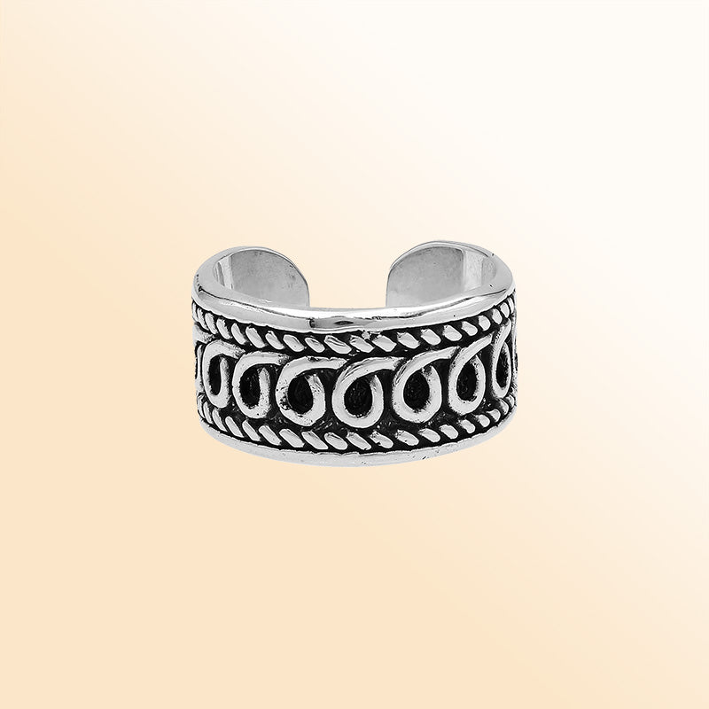 Handcrafted sterling silver open-band ring with intricate Bali swirl design and oxidized finish, adjustable unisex artisan jewelry for everyday wear or gifting.