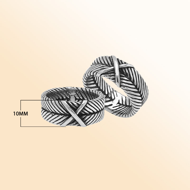 Handcrafted sterling silver band ring with X-pattern and leaf design, Bali-inspired oxidized artisan jewelry for men and women.
