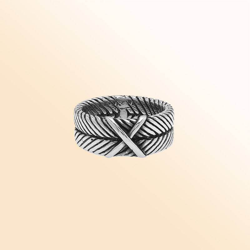 Handcrafted sterling silver band ring with X-pattern and leaf design, Bali-inspired oxidized artisan jewelry for men and women.