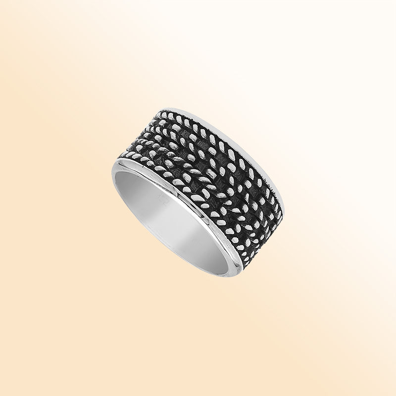 Handcrafted sterling silver wide band ring with detailed Bali dot design and oxidized finish, unisex artisan jewelry for everyday wear or gifting.