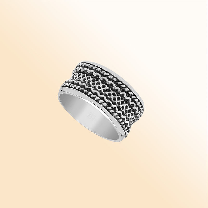 Sterling silver wide band ring with handcrafted tribal Bali design and oxidized detailing, perfect for everyday wear or special occasions.