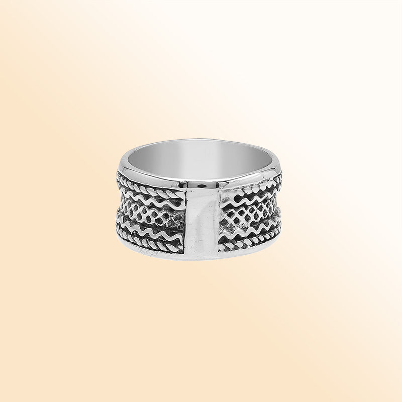 Sterling silver wide band ring with handcrafted tribal Bali design and oxidized detailing, perfect for everyday wear or special occasions.