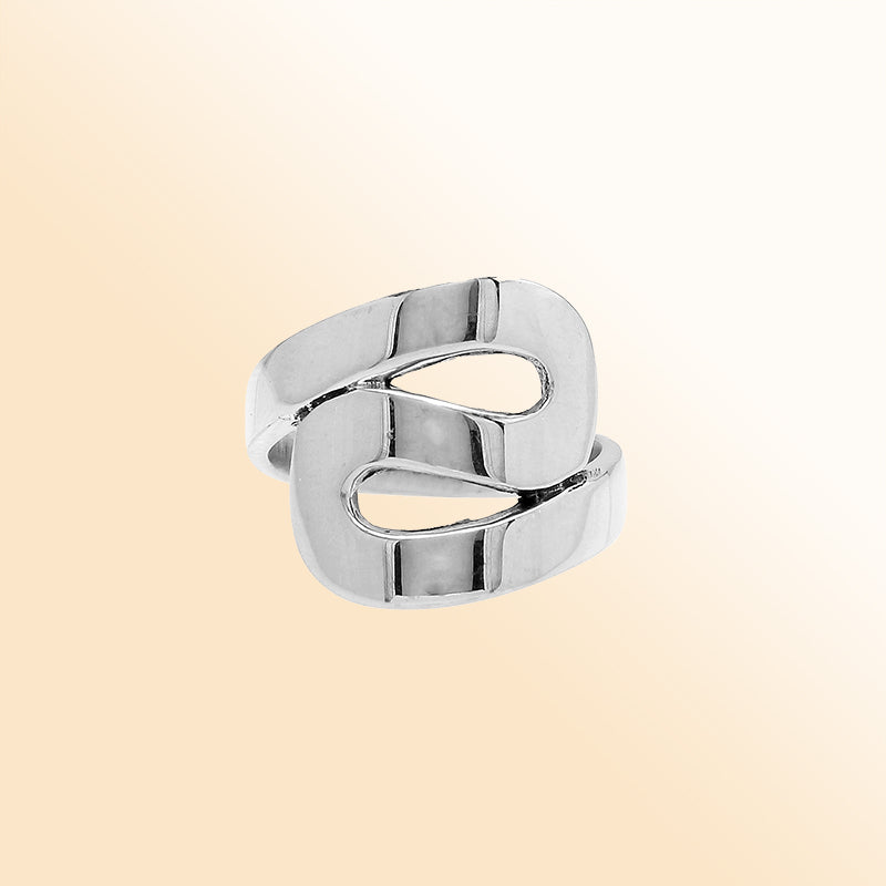 Sterling silver openwork statement ring with adjustable band, modern polished silver jewelry for everyday wear and special occasions.