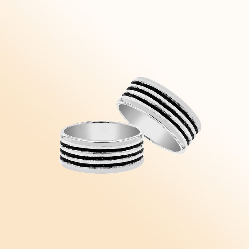 Sterling silver wide band ring with three oxidized black stripes, unisex design for men and women, handcrafted 925 silver fashion jewelry.