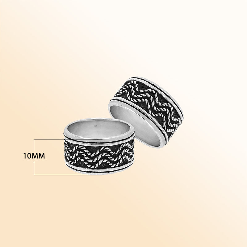 Sterling silver wide band ring with braided rope and oxidized details, handcrafted unisex 925 silver jewelry for men and women in boho style.