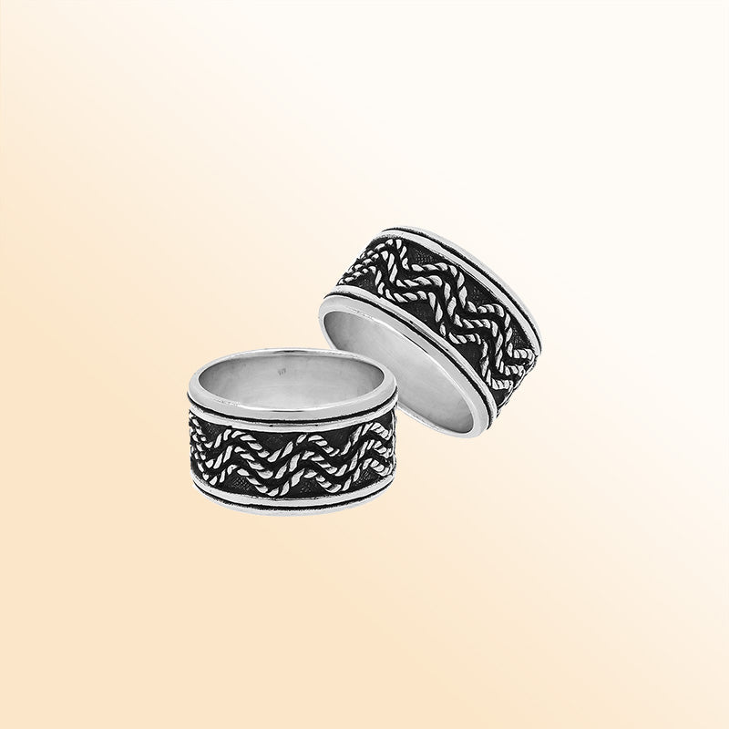 Sterling silver wide band ring with braided rope and oxidized details, handcrafted unisex 925 silver jewelry for men and women in boho style.