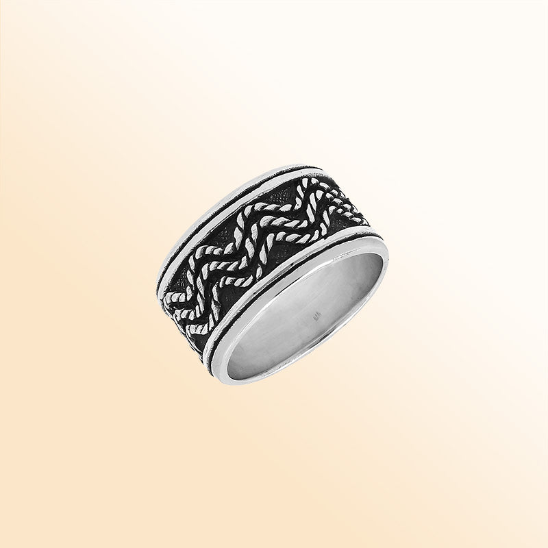 Sterling silver wide band ring with braided rope and oxidized details, handcrafted unisex 925 silver jewelry for men and women in boho style.