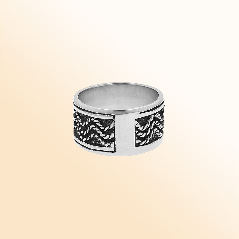 Sterling silver wide band ring with braided rope and oxidized details, handcrafted unisex 925 silver jewelry for men and women in boho style.