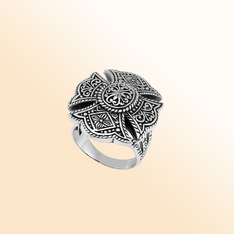 Handcrafted sterling silver statement ring with detailed Balinese floral mandala design and oxidized finish – unique boho vintage jewelry for women.