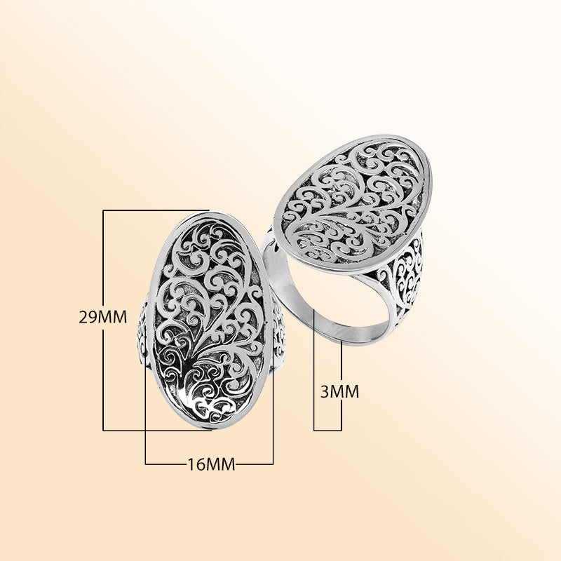 Handcrafted sterling silver oval filigree ring with intricate Balinese scrollwork and oxidized finish – elegant boho vintage jewelry for women.