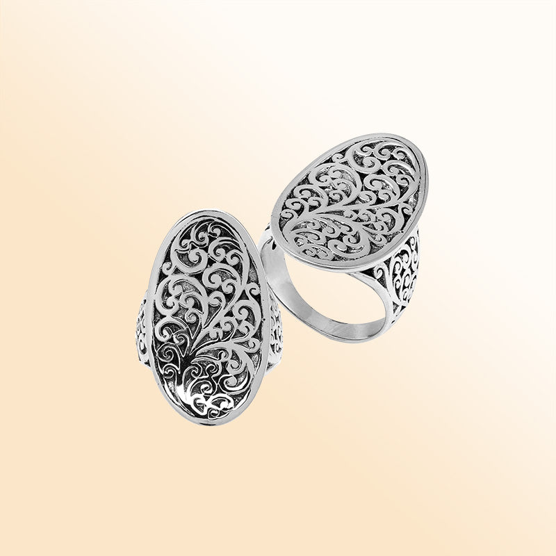 Handcrafted sterling silver oval filigree ring with intricate Balinese scrollwork and oxidized finish – elegant boho vintage jewelry for women.